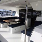 Fountaine Pajot Saba 50 catamaran cockpit with outdoor dining area and direct access to the saloon