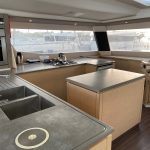 Fountaine Pajot Saba 50 catamaran galley with worktops, storage and modern appliances