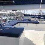 Fountaine Pajot Saba 50 catamaran flybridge with seating area and panoramic sea views