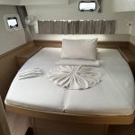 Lagoon 42 aft cabin with double bed and panoramic hull windows