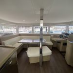 Lagoon 42 catamaran saloon with panoramic windows and modern interior