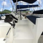Lagoon 450 catamaran helm station with steering controls and elevated sailing position