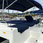 Lagoon 46 catamaran flybridge with seating area and panoramic sea views