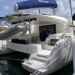 Lagoon 50 catamaran stern access with wide steps and swim platforms for boarding