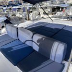 Lagoon 50 catamaran flybridge with seating area and panoramic sea views