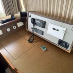 Lagoon 50 catamaran navigation station with chart table and onboard navigation equipment