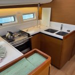 Jeanneau Sun Odyssey 440 galley with worktops, storage and onboard kitchen equipment