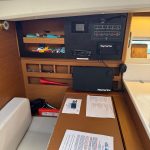 Jeanneau Sun Odyssey 440 navigation station with chart table and onboard instruments