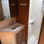 Excess 14 catamaran bathroom with separate shower and modern marine toilet