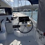 Excess 14 catamaran helm station with panoramic sailing views
