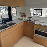 Excess 14 catamaran galley with modern open-plan kitchen