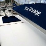 Excess 14 catamaran sunbathing area on the foredeck with panoramic Caribbean views