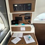 Navigation station with chart table aboard the Lagoon 380 sailing catamaran